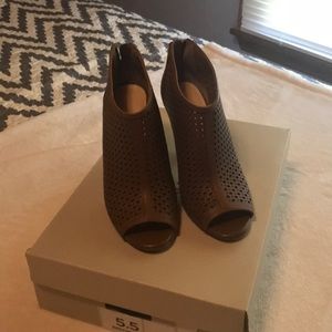 Peep toe high heels.